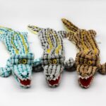 Dog chews and makes noise alligator toy