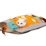 Cat scratching a blanket - Image 6