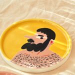 A Man's Ceramic Fruit Plate Released Into The Air - Image 5