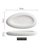 Irregular White Ceramic Dinner Plate - Image 10