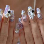 Hand Wearing Nail Art Sticker Pass Astronaut - Image 3