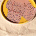 A Man's Ceramic Fruit Plate Released Into The Air - Image 3